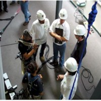 students in hard hats and safety gear