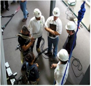 students in hard hats and safety gear